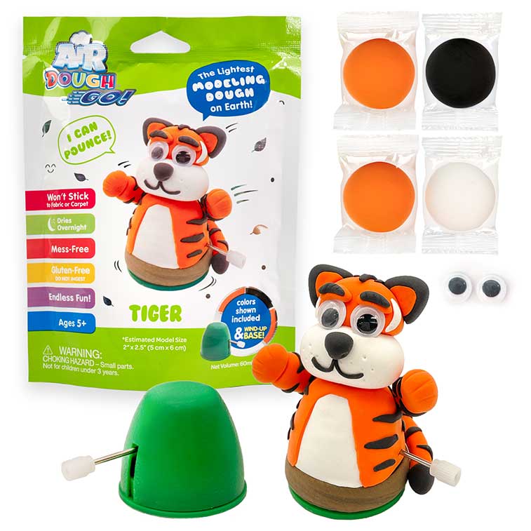 green and white Air Dough Go foil bag, orange tiger built with air dough the lightest, most amazing dough on earth, black, 2 orange, and white packs of air dough, 1 pair of googly eyes, and a  wind-up mechanism